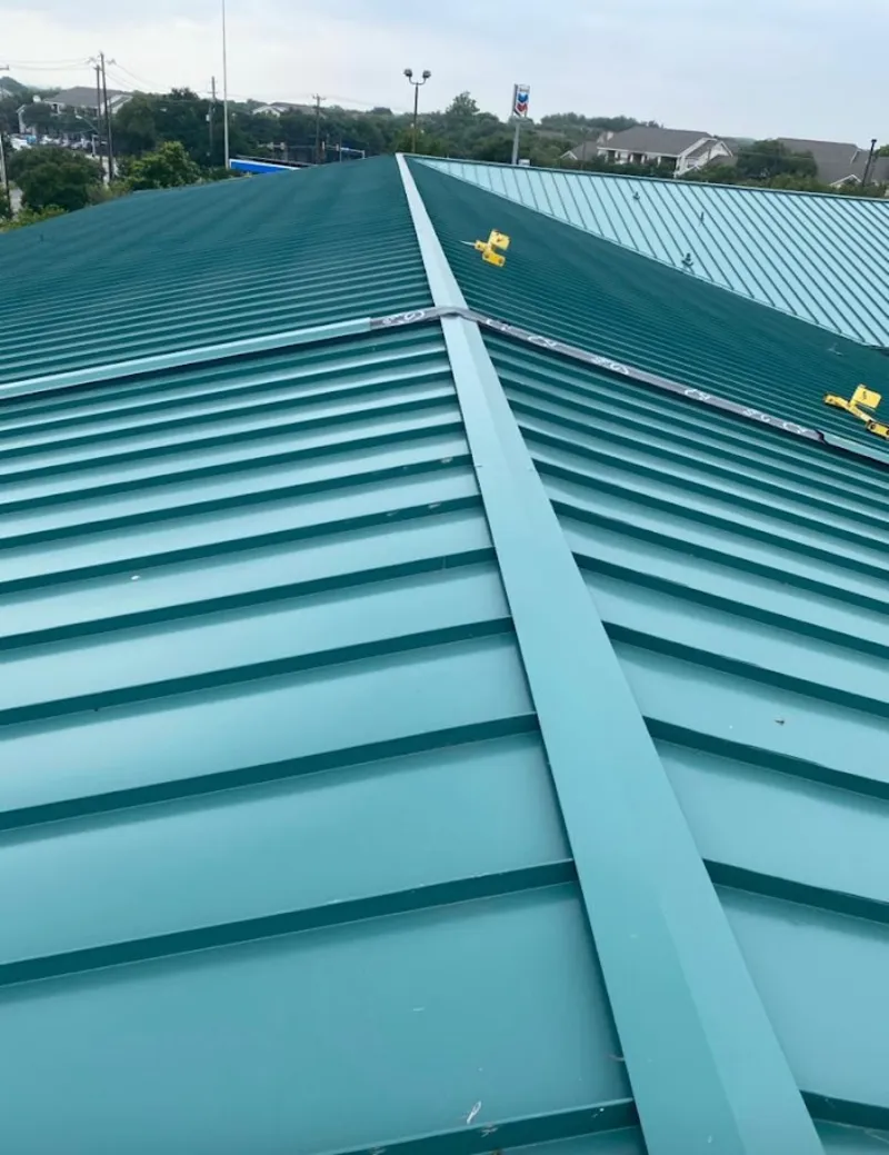 Green commercial metal roof ridge and valley for Metal Roof Repair in Lighthouse Point