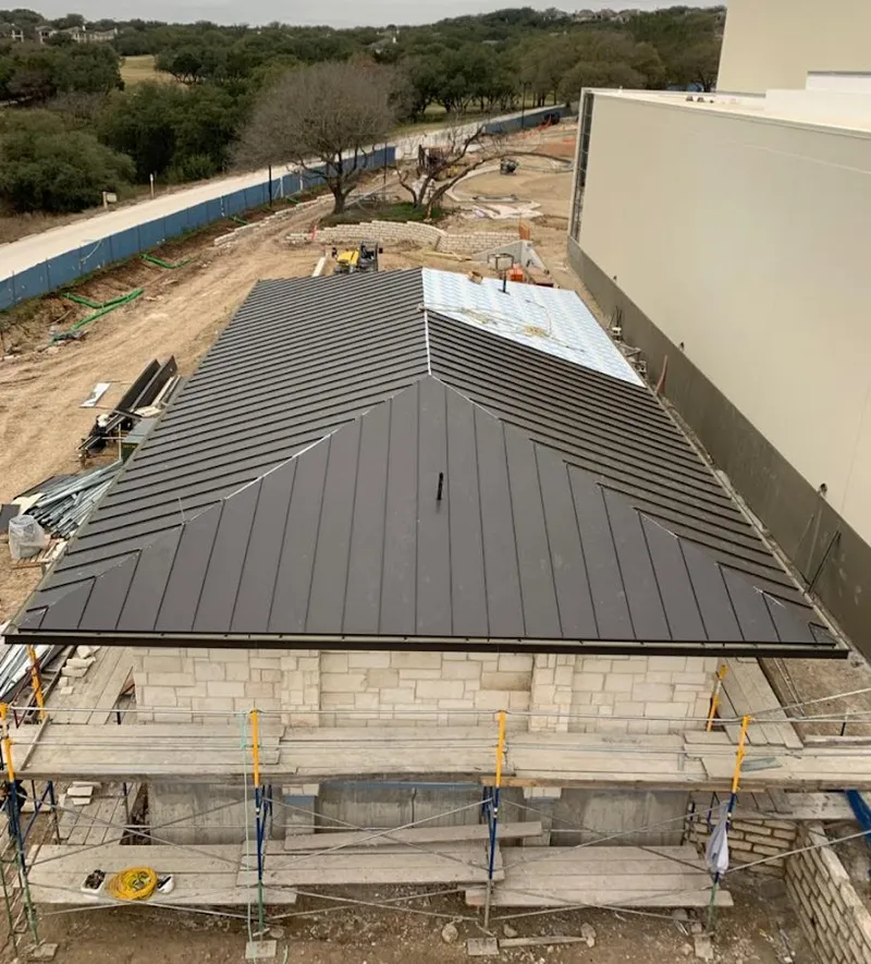 Metal roof new construction with scaffolding in Lighthouse Point