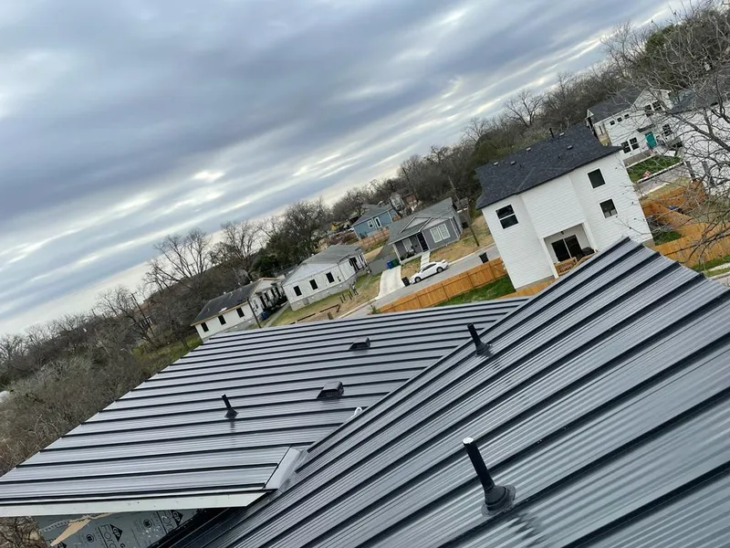 Standing seam metal roof panels with vents for Skylight Repair in Lighthouse Point